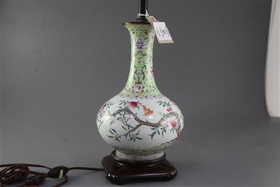 A Chinese famille rose nine peach bottle vase, Qing dynasty, total height 48.5cm including stand and fittings, some restoration